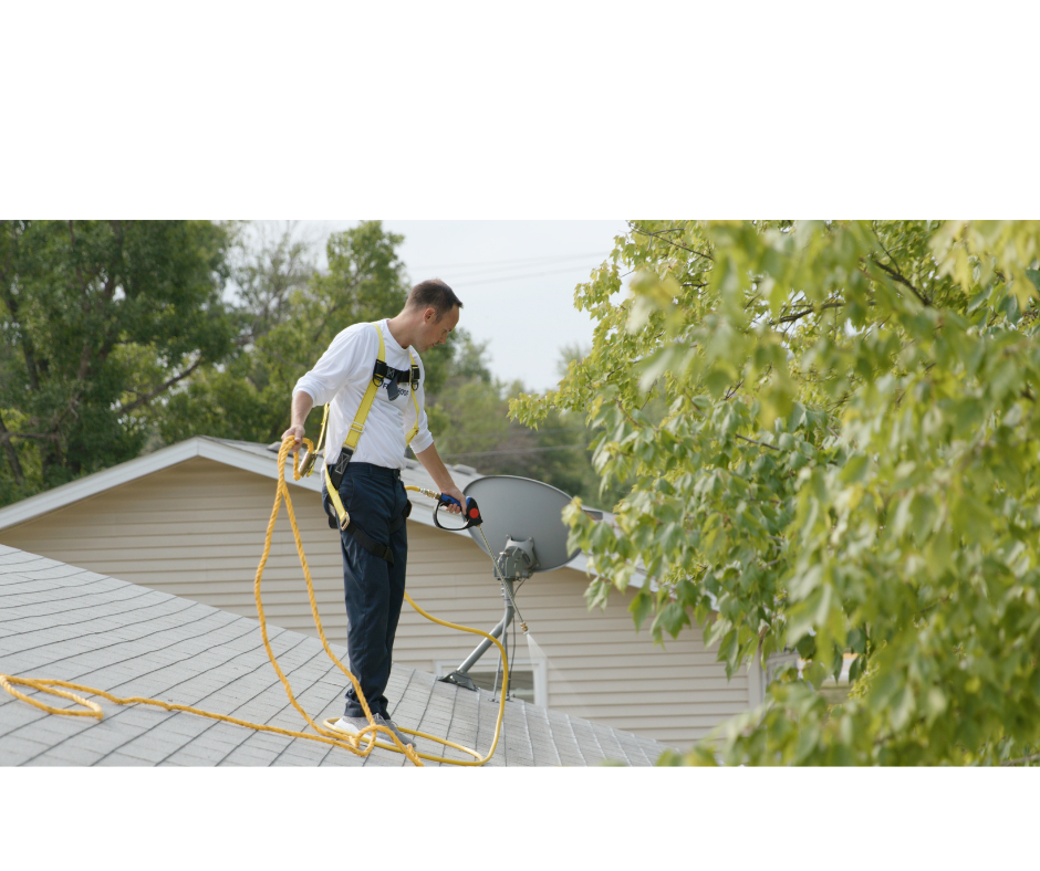 NorCal Fresh Roof technician applying GreenSoy treatment with safety harness on a residential roof